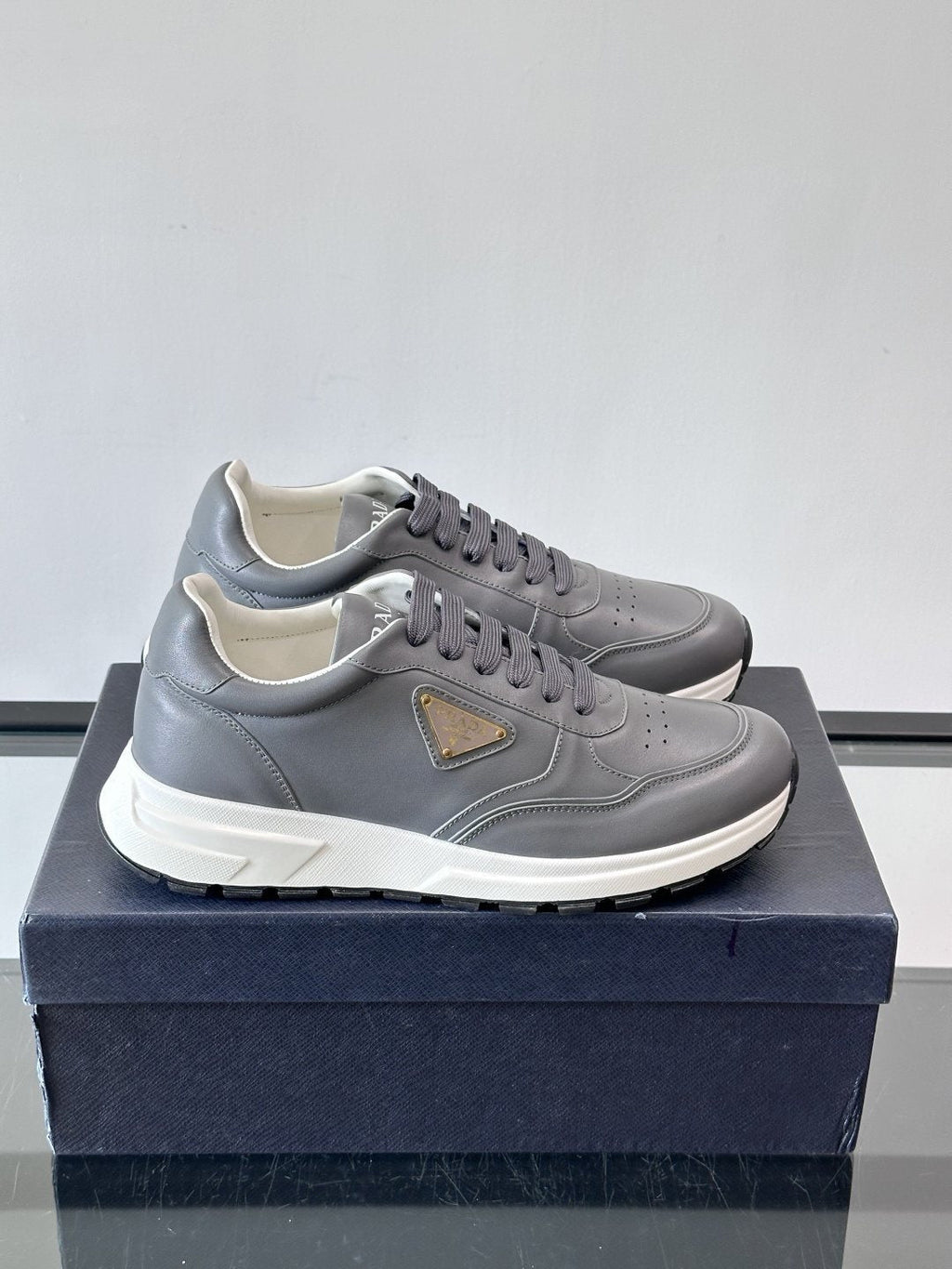 Prada Men's Triangle Plaque Low-Top Sneakers - Thick Lug Sole